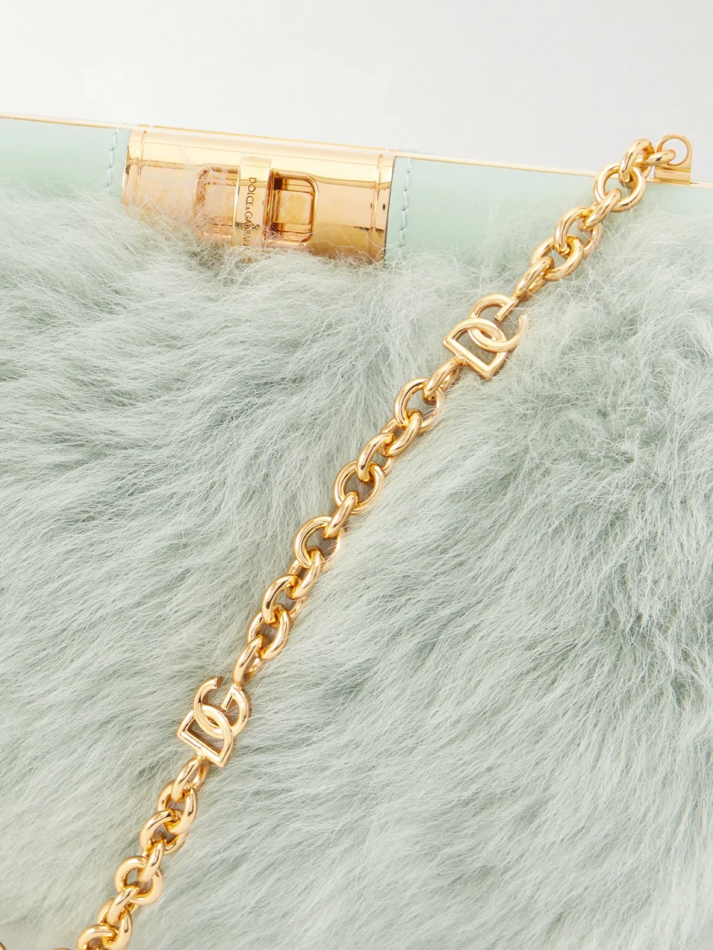 Close-up detail of the Dolce & Gabbana Marlene Leather-trimmed Shearling Shoulder Bag