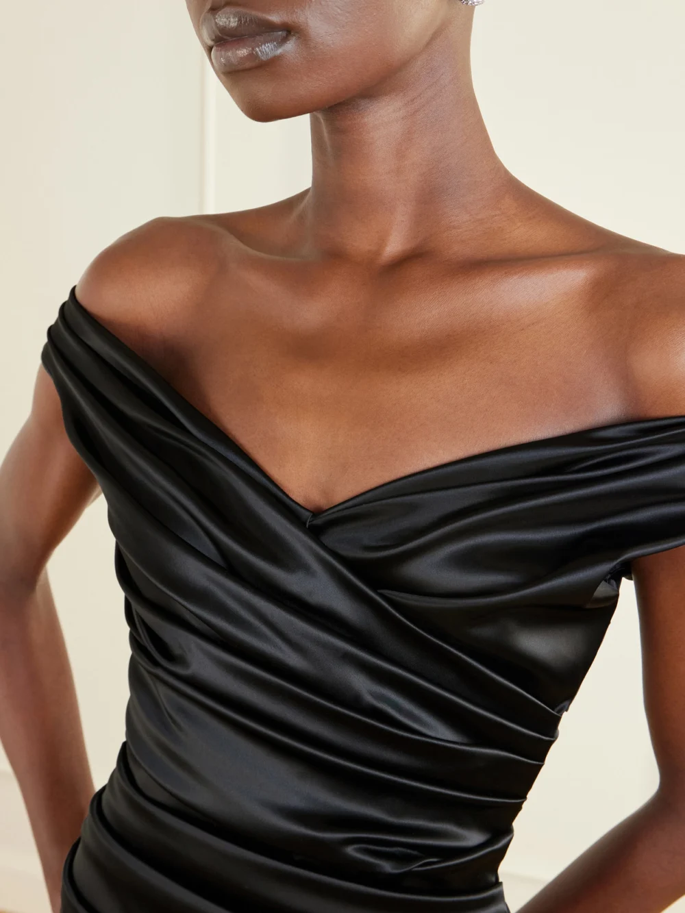 Close-up detail of the Dolce & Gabbana Off-the-shoulder Draped Satin Midi Dress