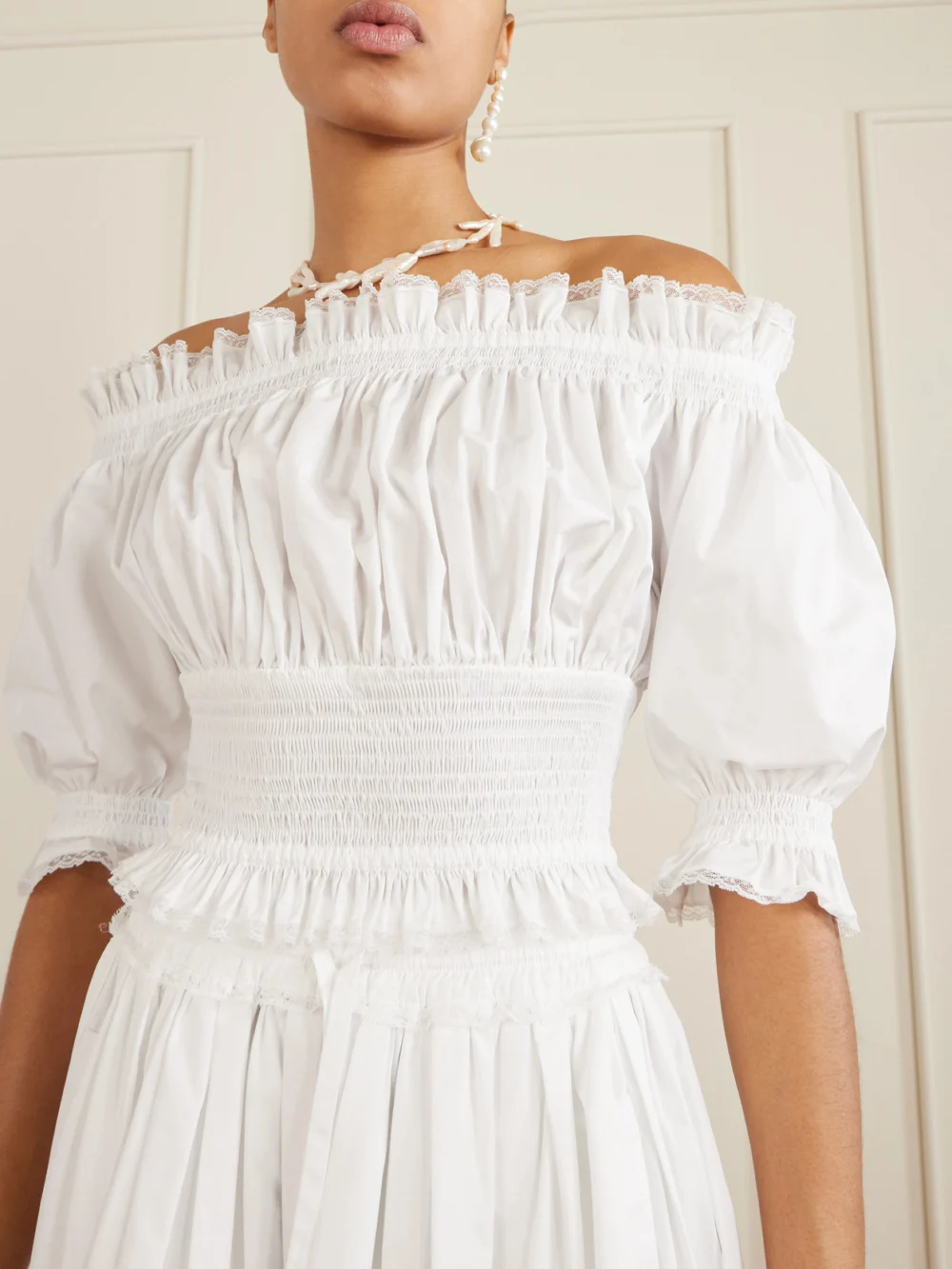 Close-up detail of the Dolce & Gabbana Off-the-shoulder Lace-trimmed Shirred Cotton-blend Poplin Top