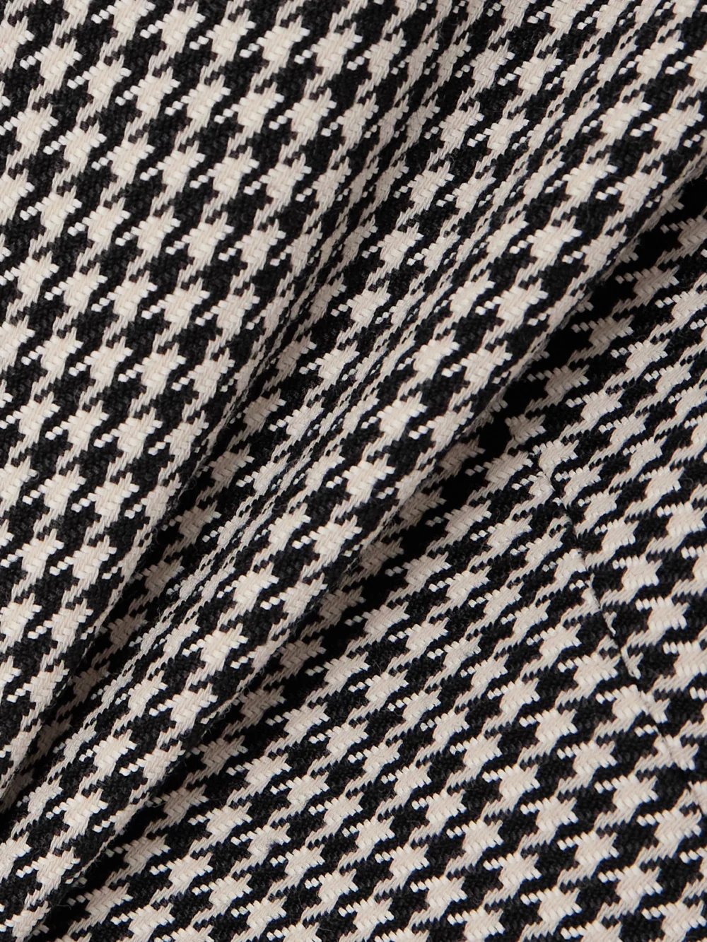 Close-up detail of the Dolce & Gabbana Open-back Houndstooth Wool-blend Mini Dress