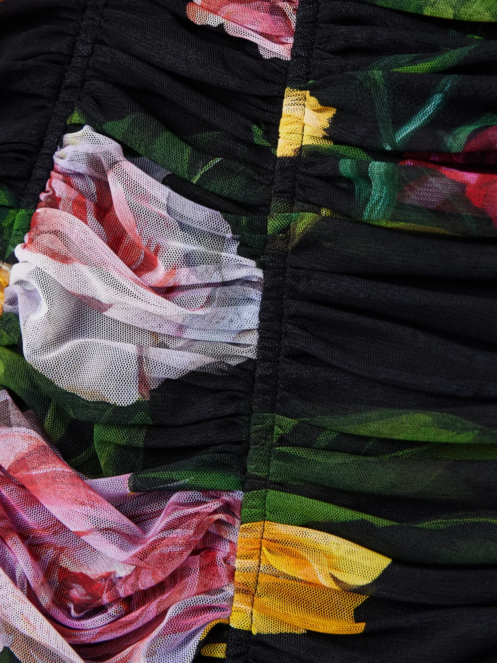 Close-up detail of the Dolce & Gabbana Paneled Ruched Floral-print Tulle Dress