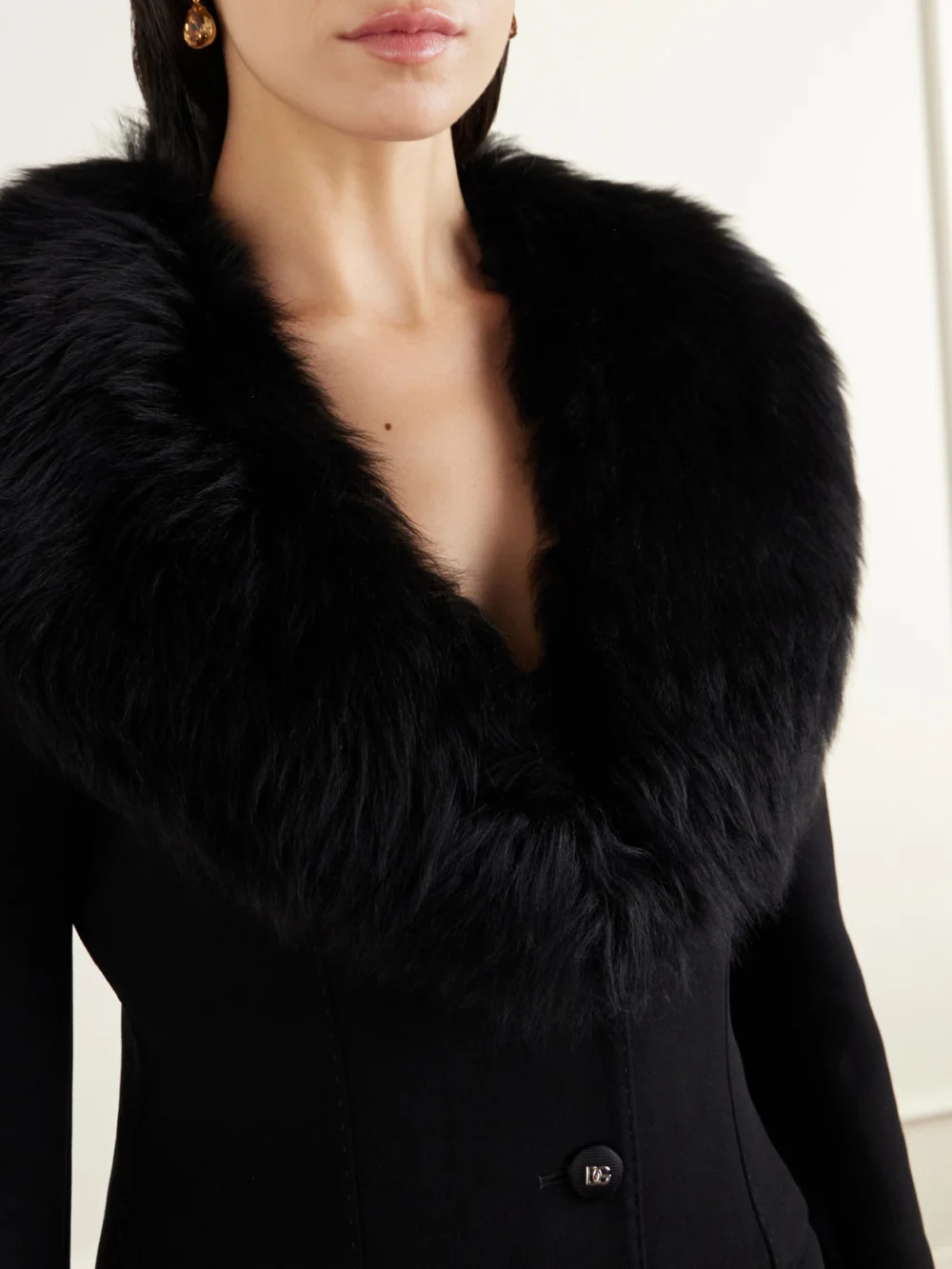Close-up detail of the Dolce & Gabbana Peplum Plush-trimmed Wool-blend Jacket