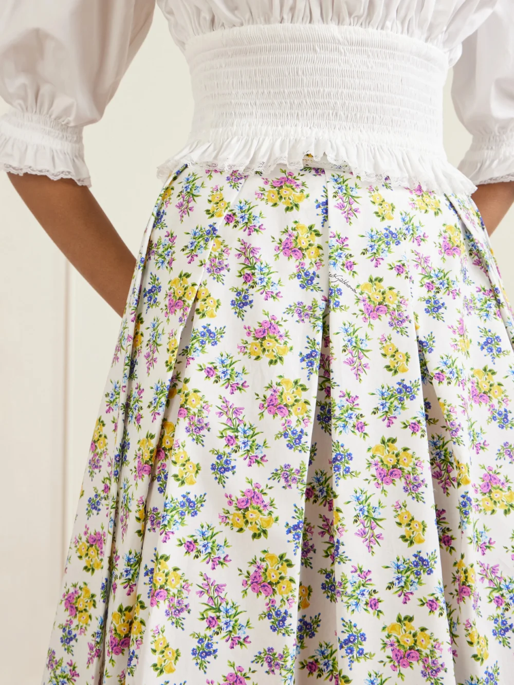 Close-up detail of the Dolce & Gabbana Pleated Floral-print Cotton-poplin Midi Skirt