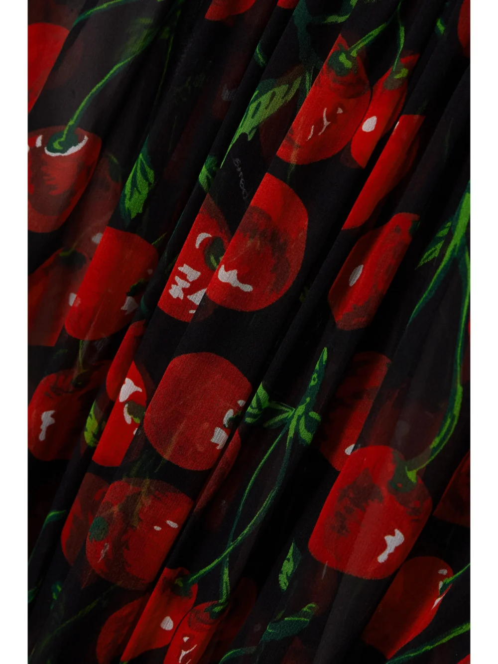Close-up detail of the Dolce & Gabbana Printed Pleated Silk-chiffon Mini Dress