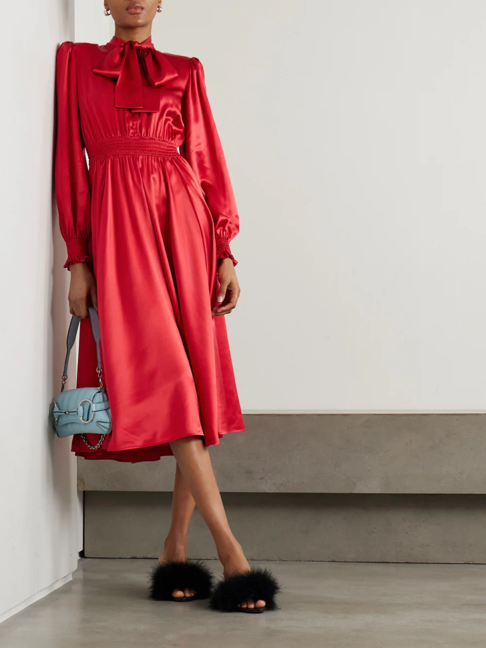 Dolce & Gabbana Pussy-bow Smocked Pleated Silk-satin Midi Dress, worn by a model