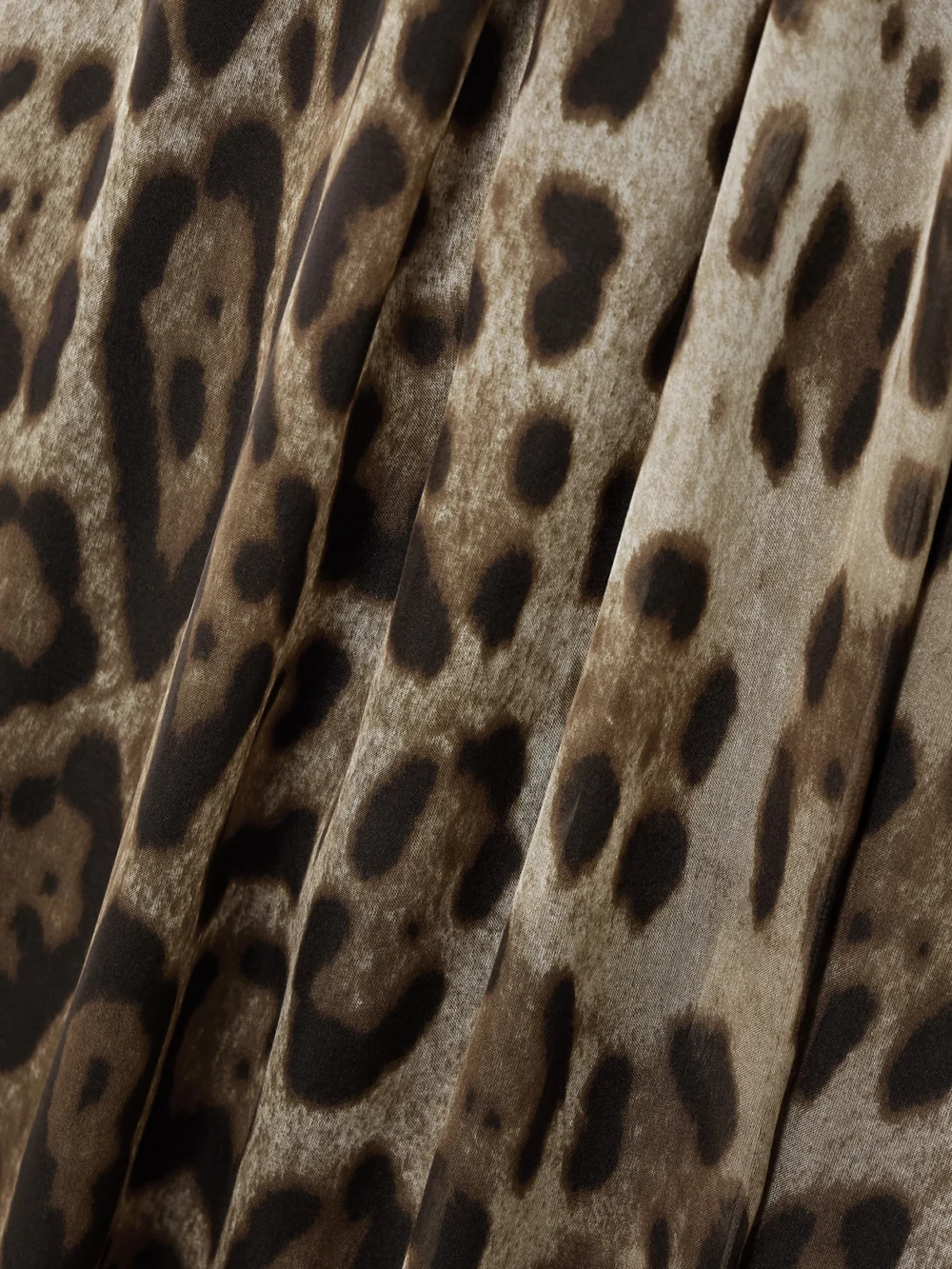 Close-up detail of the Dolce & Gabbana Scarf-detailed Smocked Leopard-print Silk-chiffon Gown