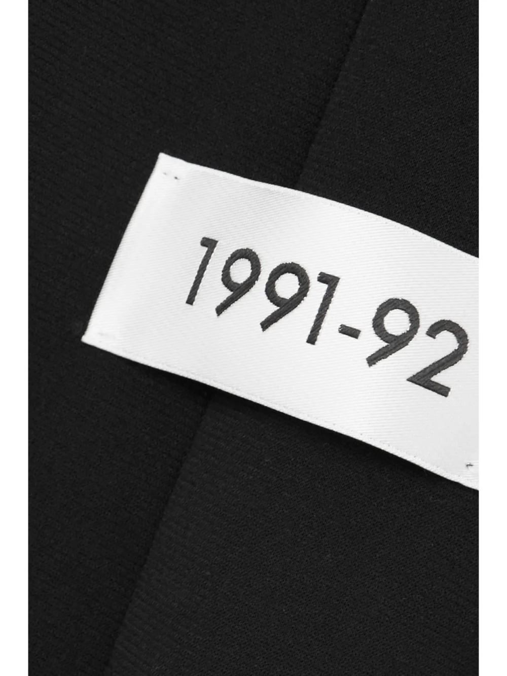 Close-up detail of the Dolce & Gabbana Stretch-jersey Turtleneck Jumpsuit