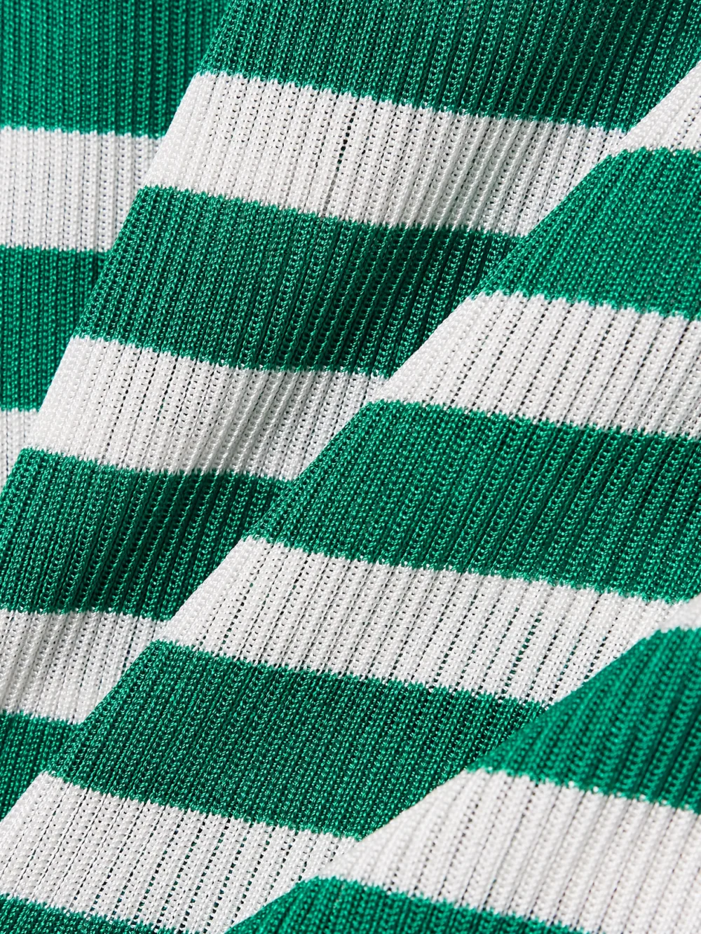 Close-up detail of the Dolce & Gabbana Striped Ribbed-knit Polo Shirt
