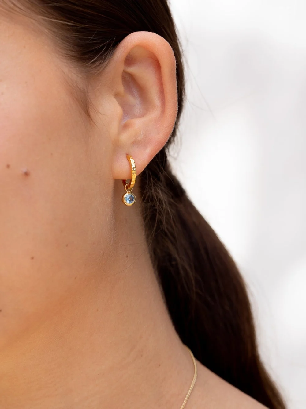 Dower & Hall Blue Topaz Hammered Huggie Hoops, view 2