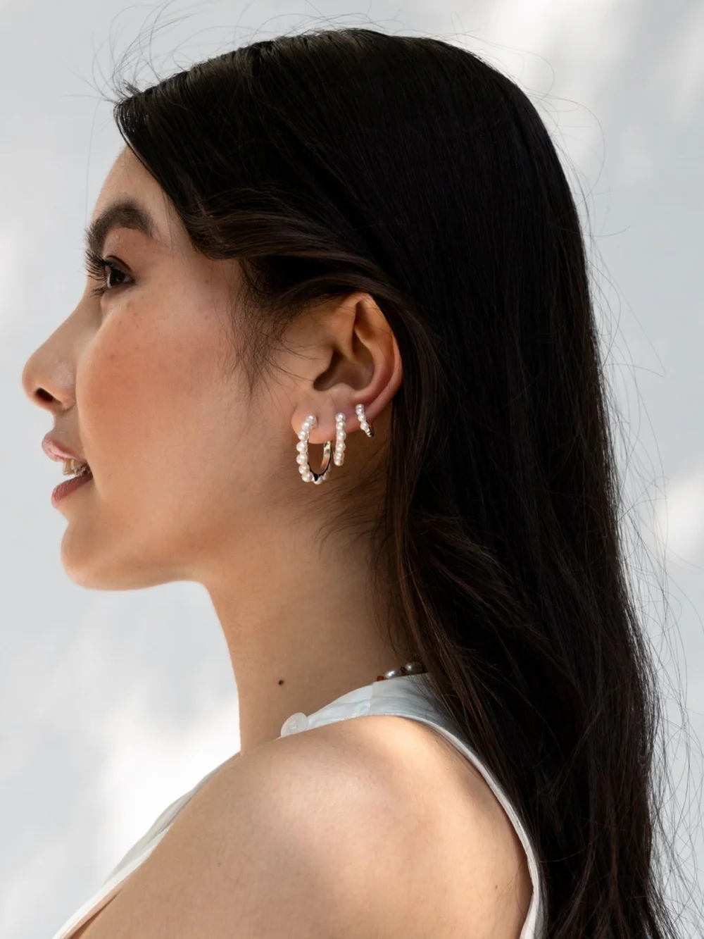 Dower & Hall Small Luna Pearl Huggie Hoops, view 4