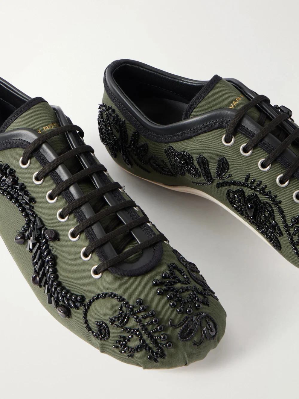 Close-up detail of the Dries Van Noten Bead-embellished Leather-trimmed Twill Sneakers