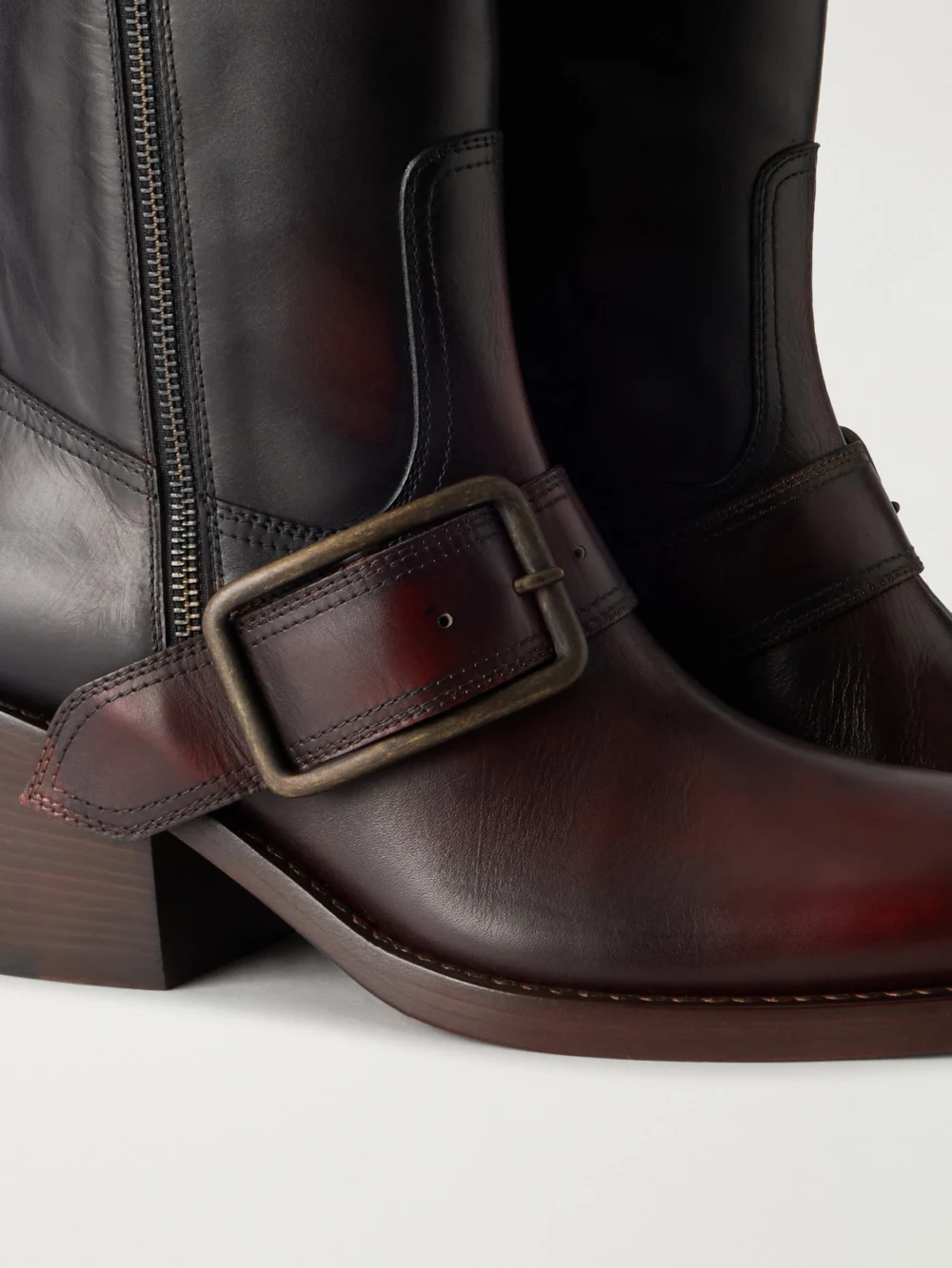 Close-up detail of the Dries Van Noten Buckle-detail Leather Knee Boots