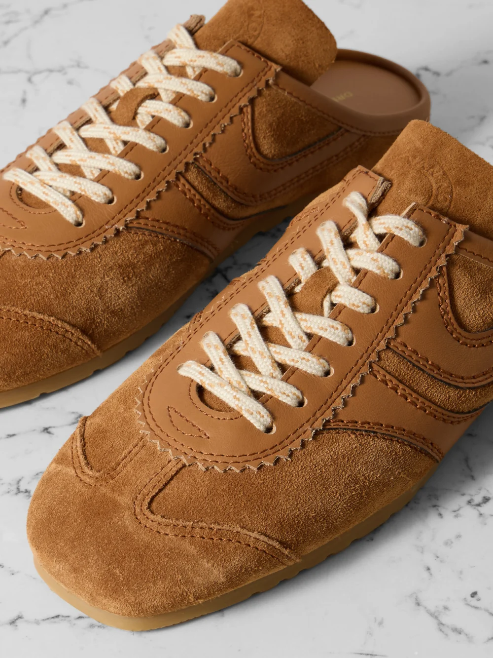 Close-up detail of the Dries Van Noten Leather-trimmed Suede Slip-on Sneakers