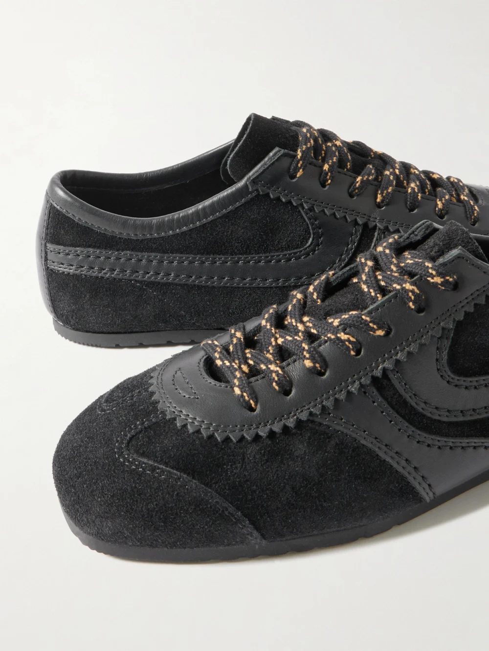Close-up detail of the Dries Van Noten Leather-trimmed Suede Sneakers