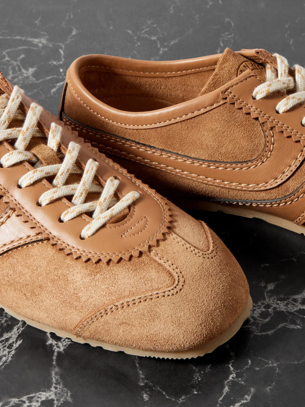 Close-up detail of the Dries Van Noten Leather-trimmed Suede Sneakers