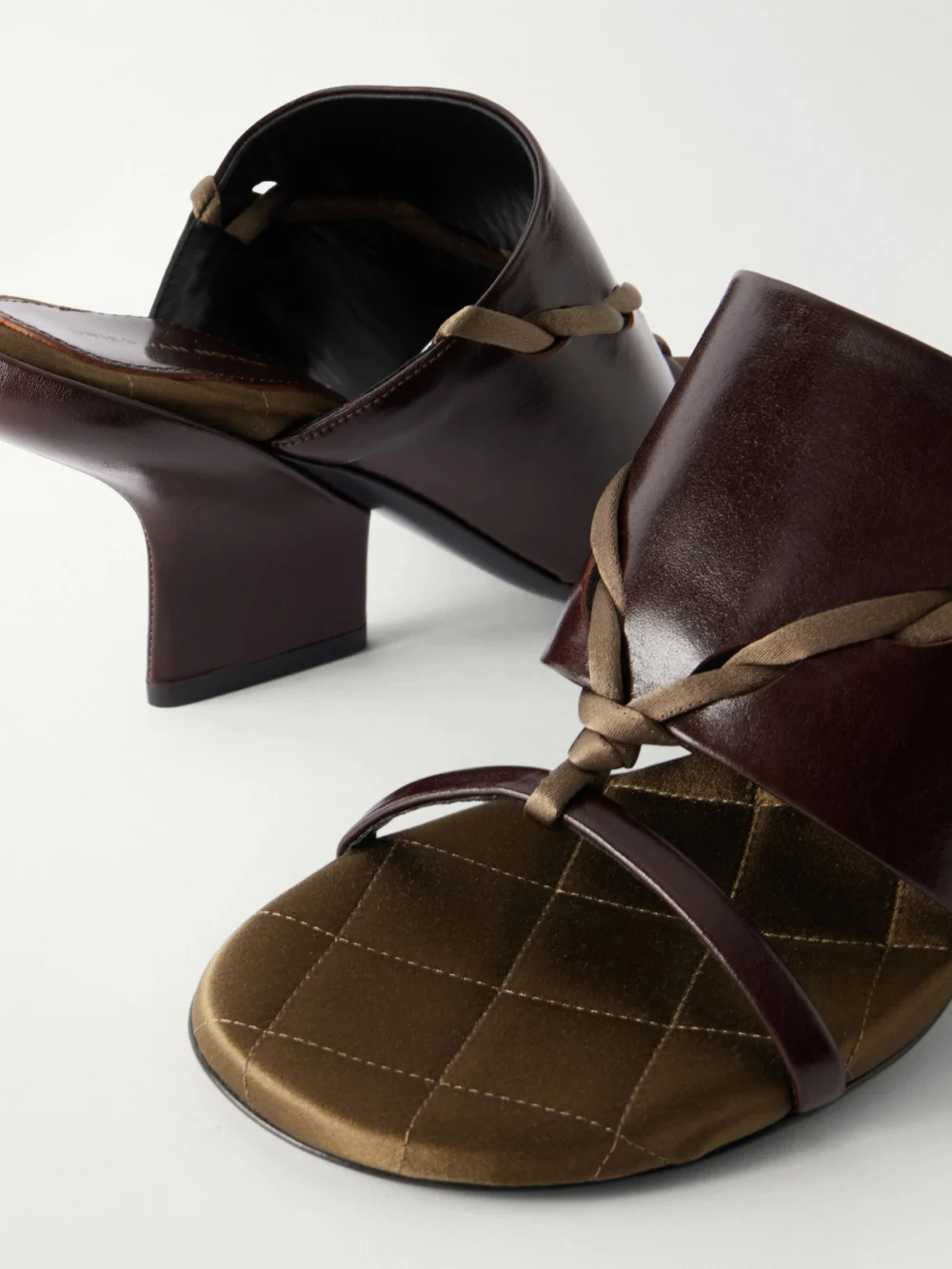 Close-up detail of the Dries Van Noten Satin-trimmed Leather Mules