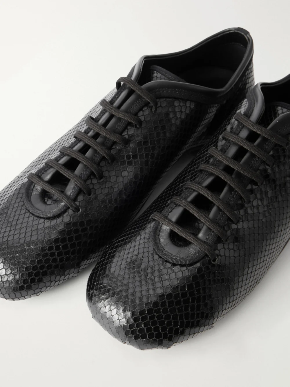 Close-up detail of the Dries Van Noten Snake-effect Leather Sneakers