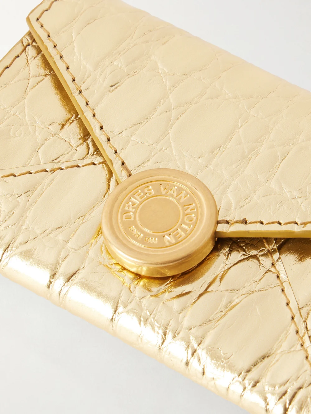 Close-up detail of the Dries Van Noten Textured Metallic Croc-effect Leather Wallet
