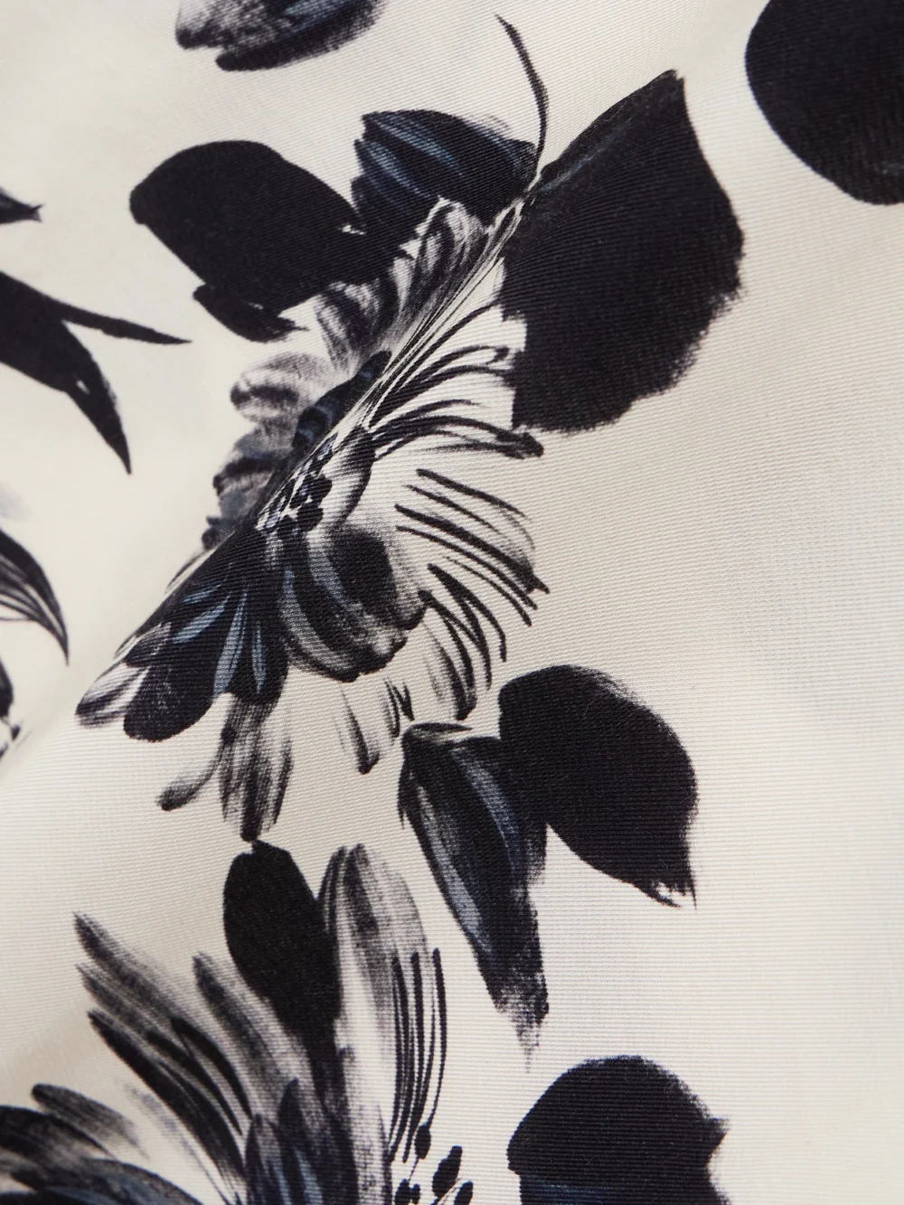 Close-up detail of the Emilia Wickstead Drifa Ruffled Floral-print Twill Maxi Dress