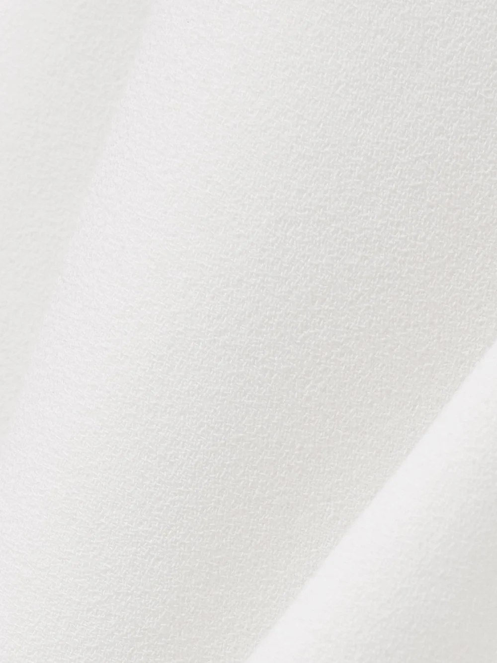 Close-up detail of the Emilia Wickstead Easter Wool-crepe Mini Dress