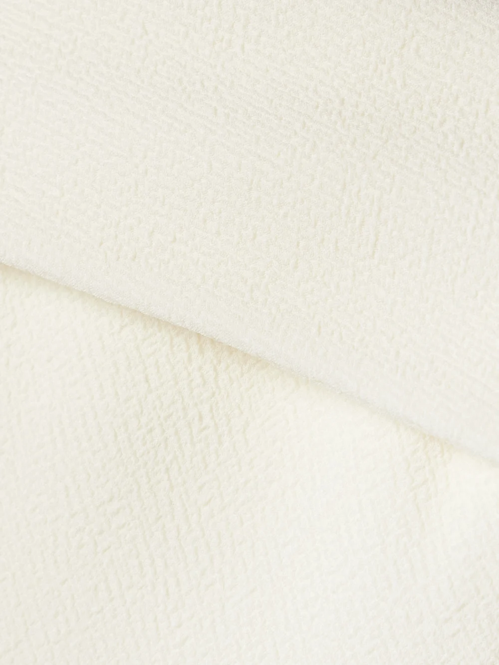 Close-up detail of the Emilia Wickstead Keeley Strapless Cloqué Maxi Dress