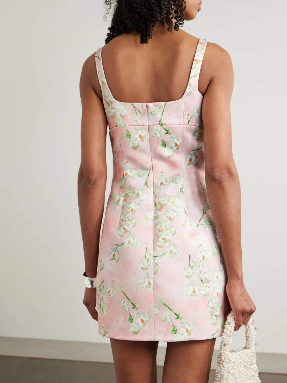Back view of the Emilia Wickstead Levisa Pleated Floral-print Satin Mini Dress