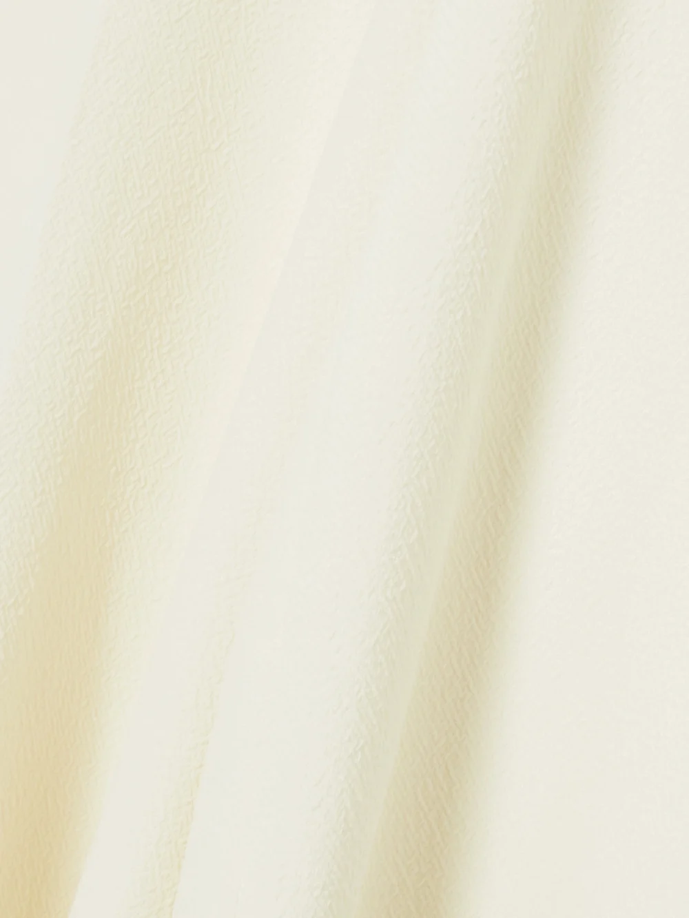 Close-up detail of the Emilia Wickstead Ross Crepe Wide-leg Jumpsuit
