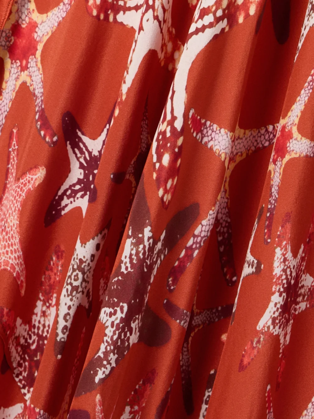 Close-up detail of the Emporio Sirenuse Ariele Printed Silk-crepe Top