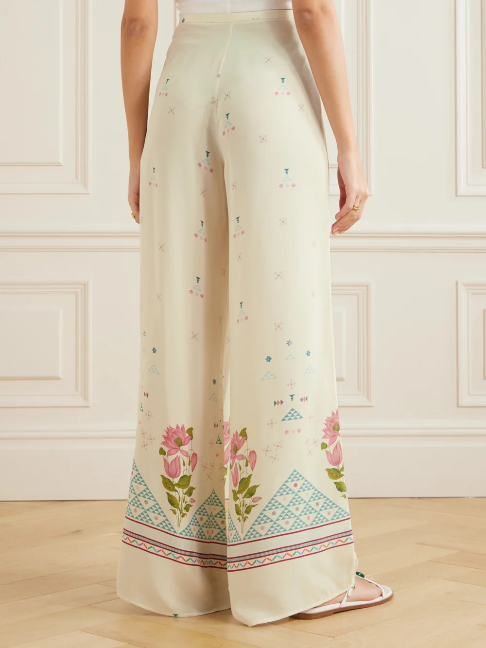 Back view of the Emporio Sirenuse Blair Printed Silk Wide-leg Pants