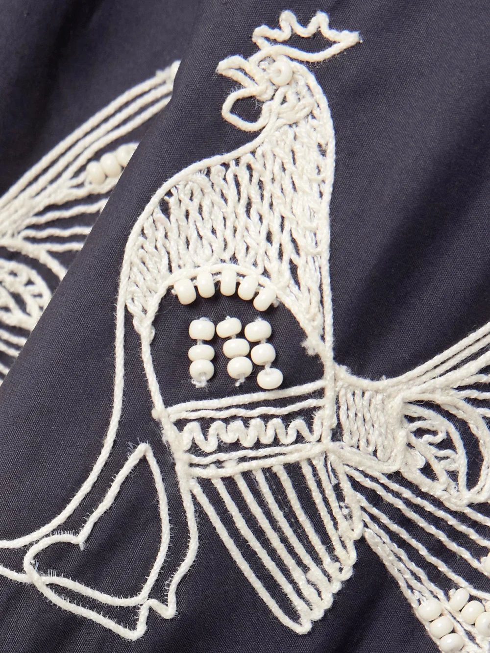 Close-up detail of the Emporio Sirenuse Camille Embellished Embroidered Cotton-blend Maxi Skirt