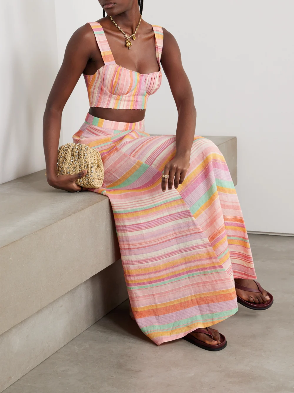 Emporio Sirenuse Dalia Frayed Pleated Striped Linen Bustier Top, worn by a model