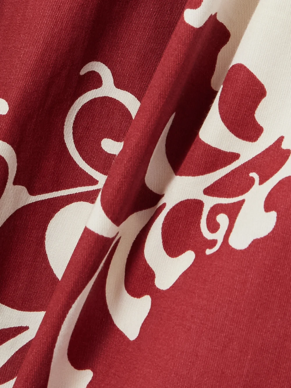 Close-up detail of the Emporio Sirenuse Flaminia Pleated Floral-print Cotton-gabardine Maxi Skirt