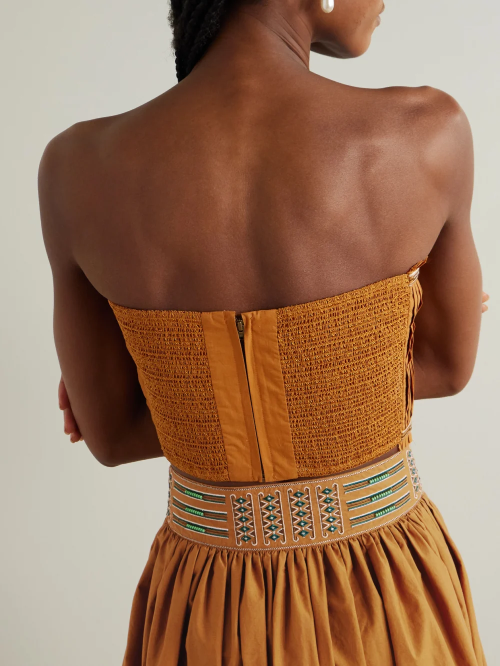 Back view of the Emporio Sirenuse Flavia Strapless Cropped Embroidered Cotton Top