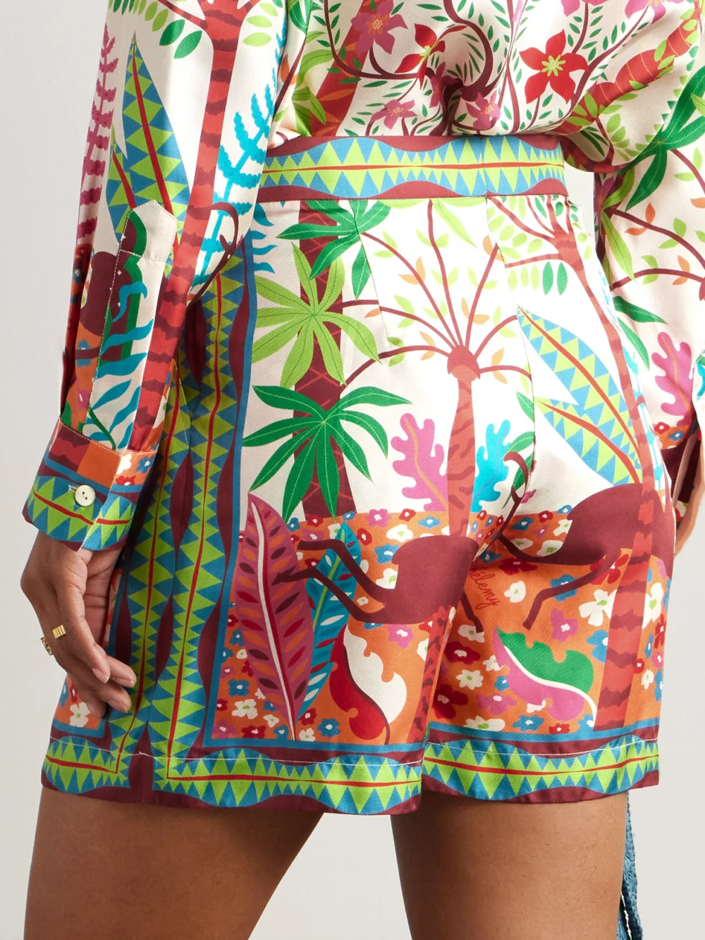 Back view of the Emporio Sirenuse + Louis Barthélemy Pleated Printed Silk-twill Shorts