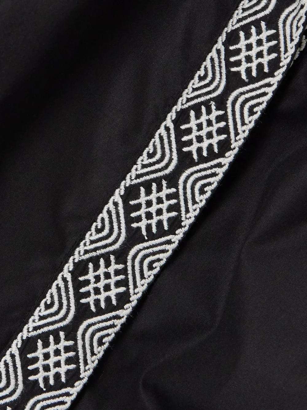 Close-up detail of the Emporio Sirenuse Nevada Cropped Embroidered Cotton-blend Poplin Vest