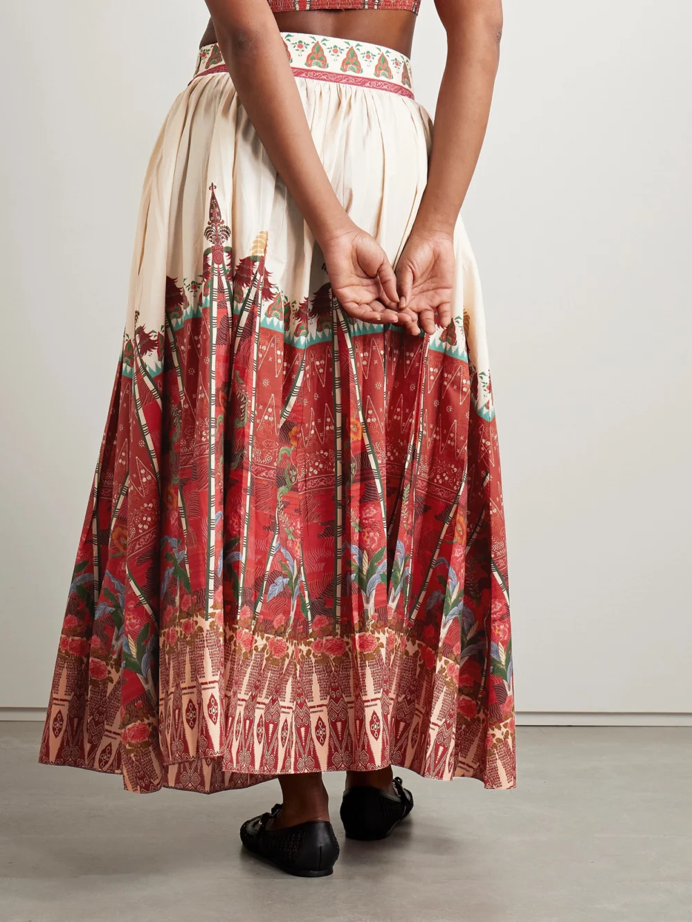 Back view of the Emporio Sirenuse Ombretta Pleated Printed Cotton Maxi Skirt
