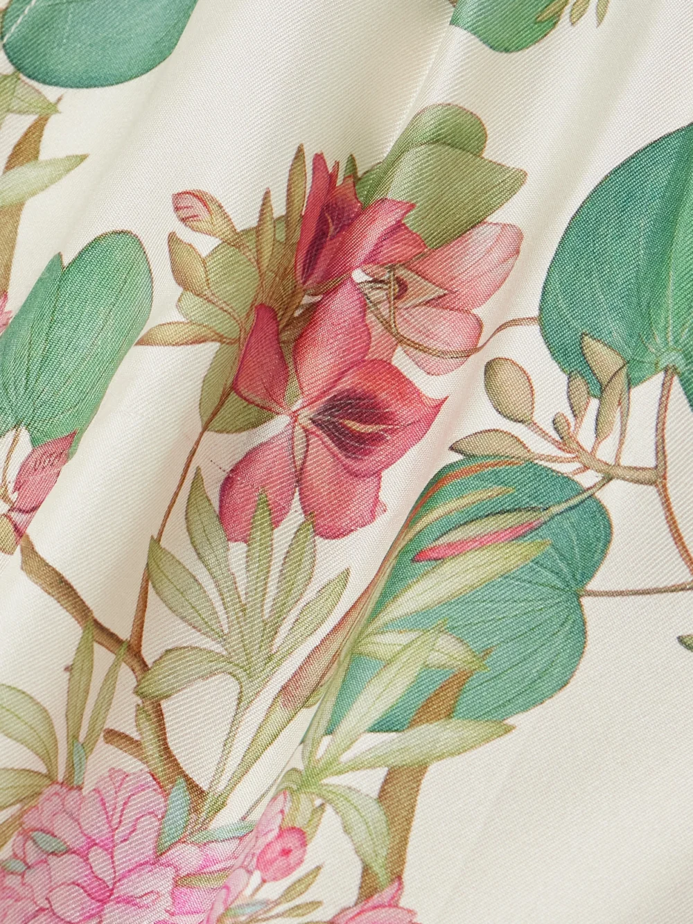 Close-up detail of the Emporio Sirenuse Tamu Pleated Floral-print Silk-twill Shorts