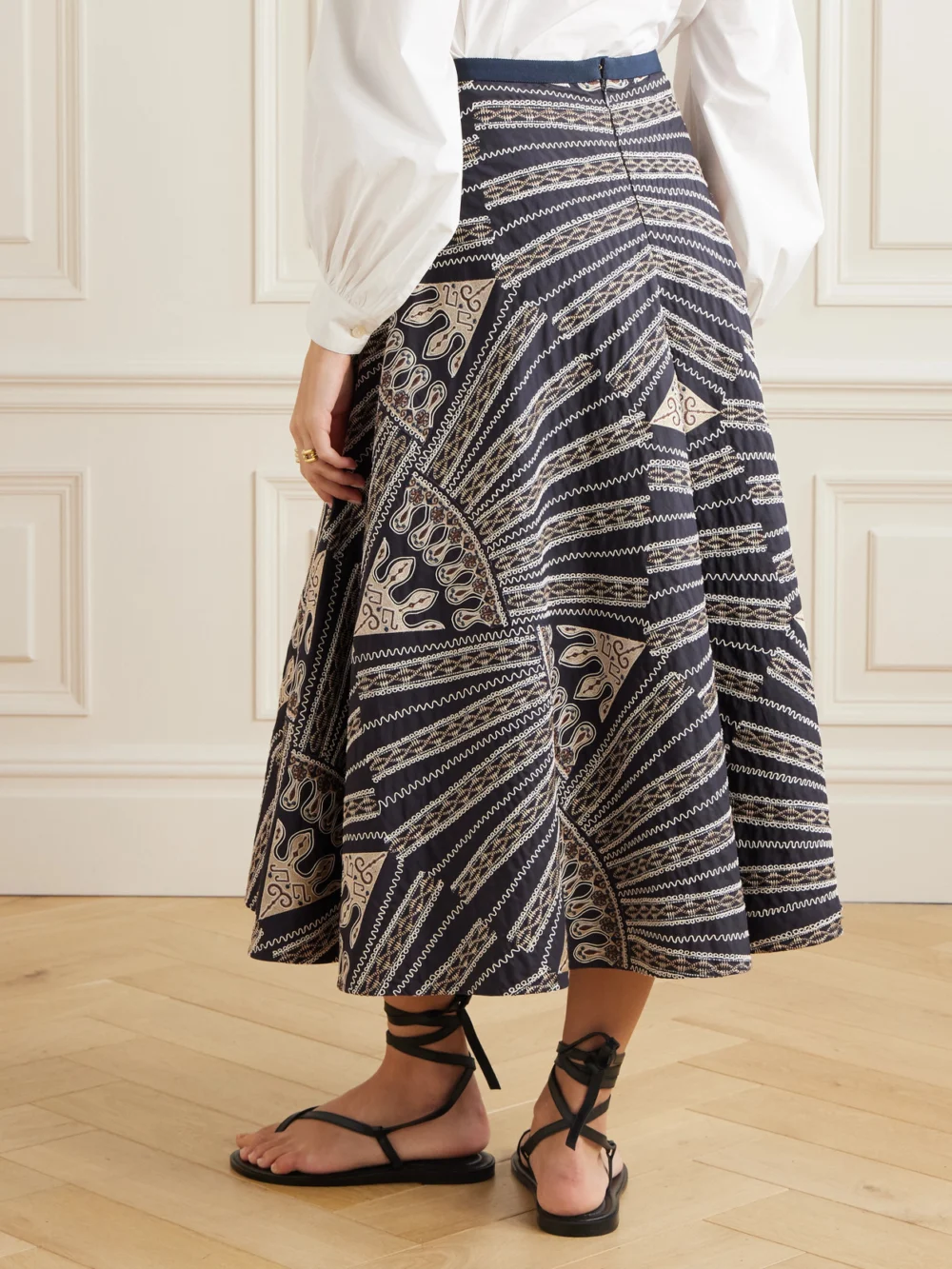 Back view of the Emporio Sirenuse Tasha 2 Calliope Paneled Embroidered Cotton-blend Poplin Midi Skirt