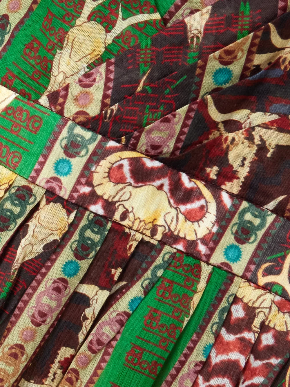 Close-up detail of the Emporio Sirenuse Tullia Arizona Pleated Printed Cotton Maxi Dress