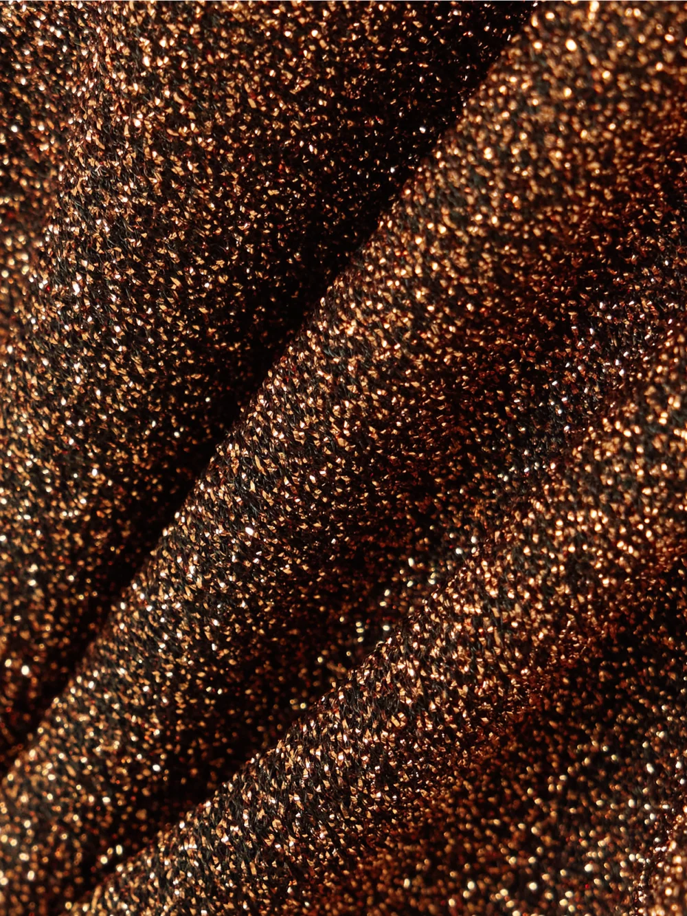 Close-up detail of the Eres Irisée Etincelant Metallic Bikini Briefs