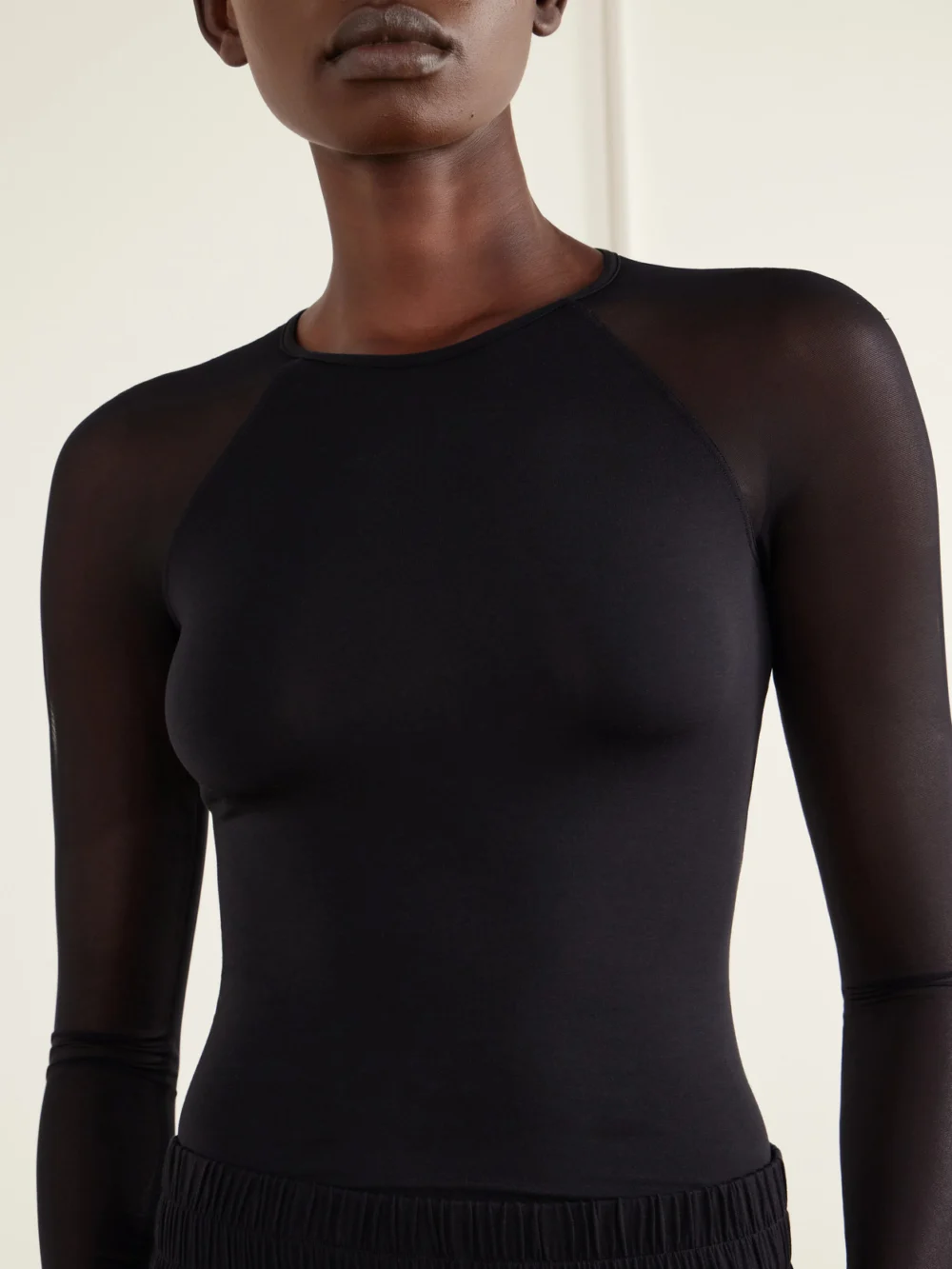 Close-up detail of the Eres Marita Mesh-trimmed Stretch-modal and Silk-blend Top