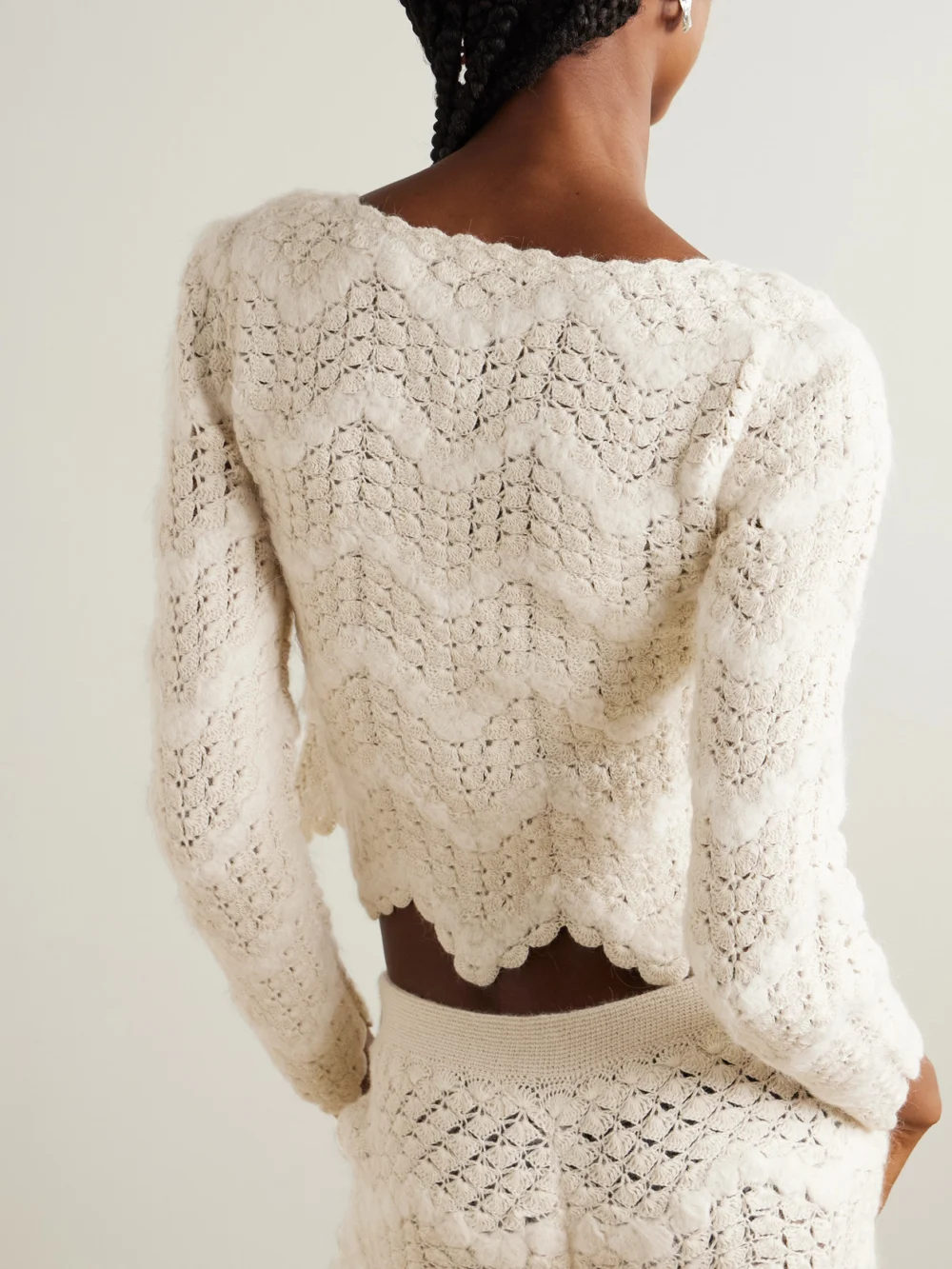 Back view of the Escvdo Brisa Scalloped Crocheted Alpaca Top