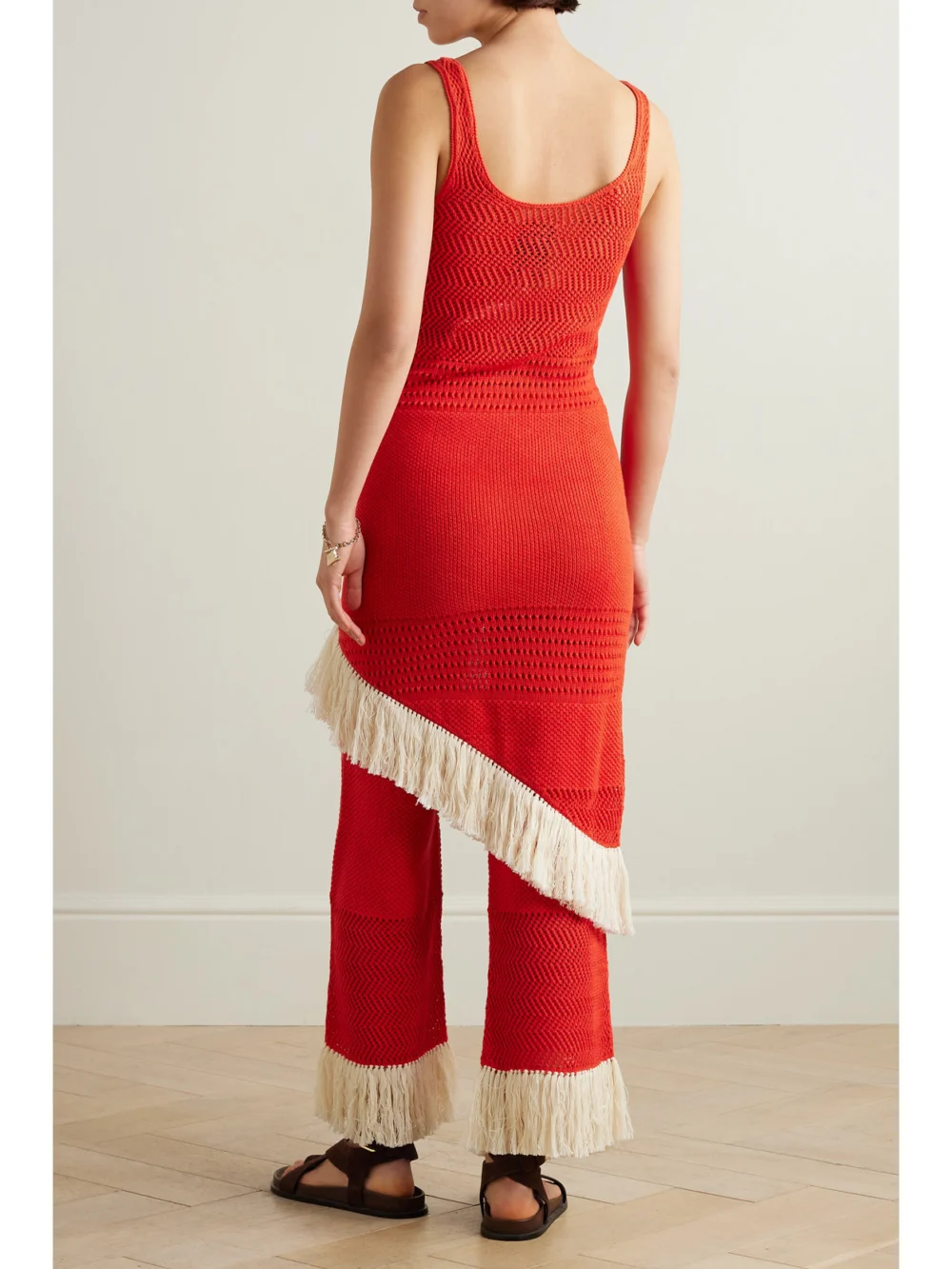 Back view of the Escvdo Carisa Fringed Asymmetric Cotton Midi Dress