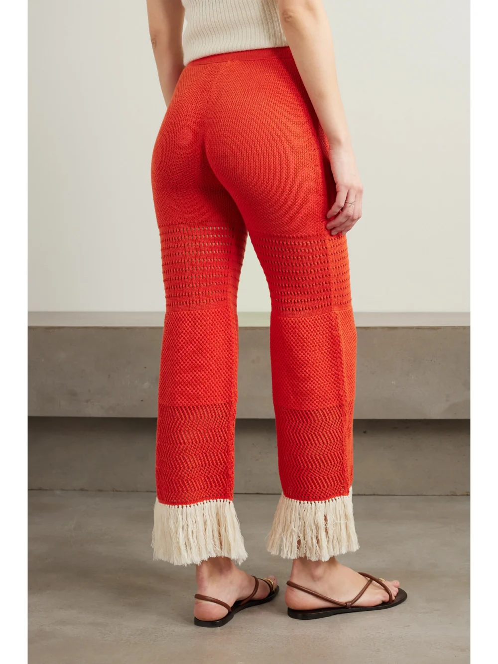 Back view of the Escvdo Carisa Fringed Flared Cotton Pants