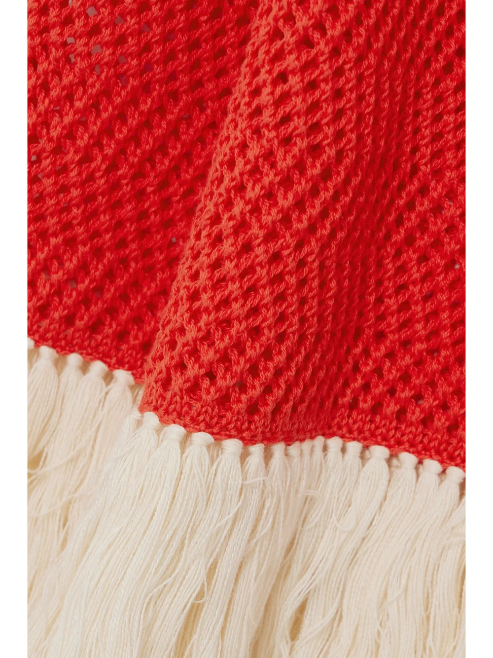 Close-up detail of the Escvdo Carisa Fringed Flared Cotton Pants