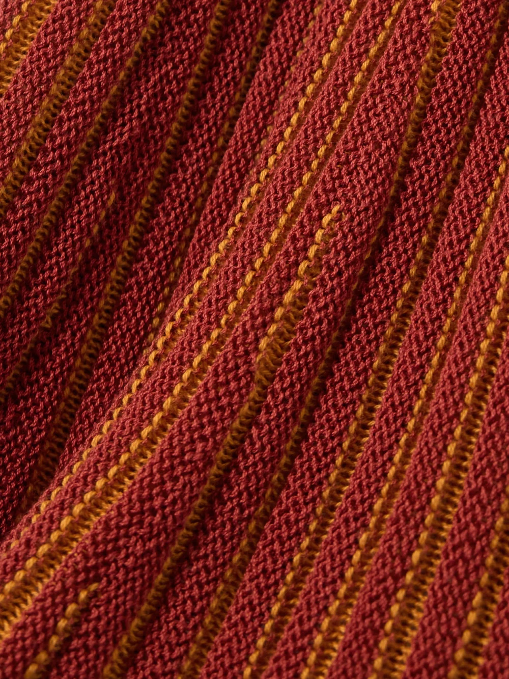 Close-up detail of the Escvdo Marina Ribbed-knit Midi Dress