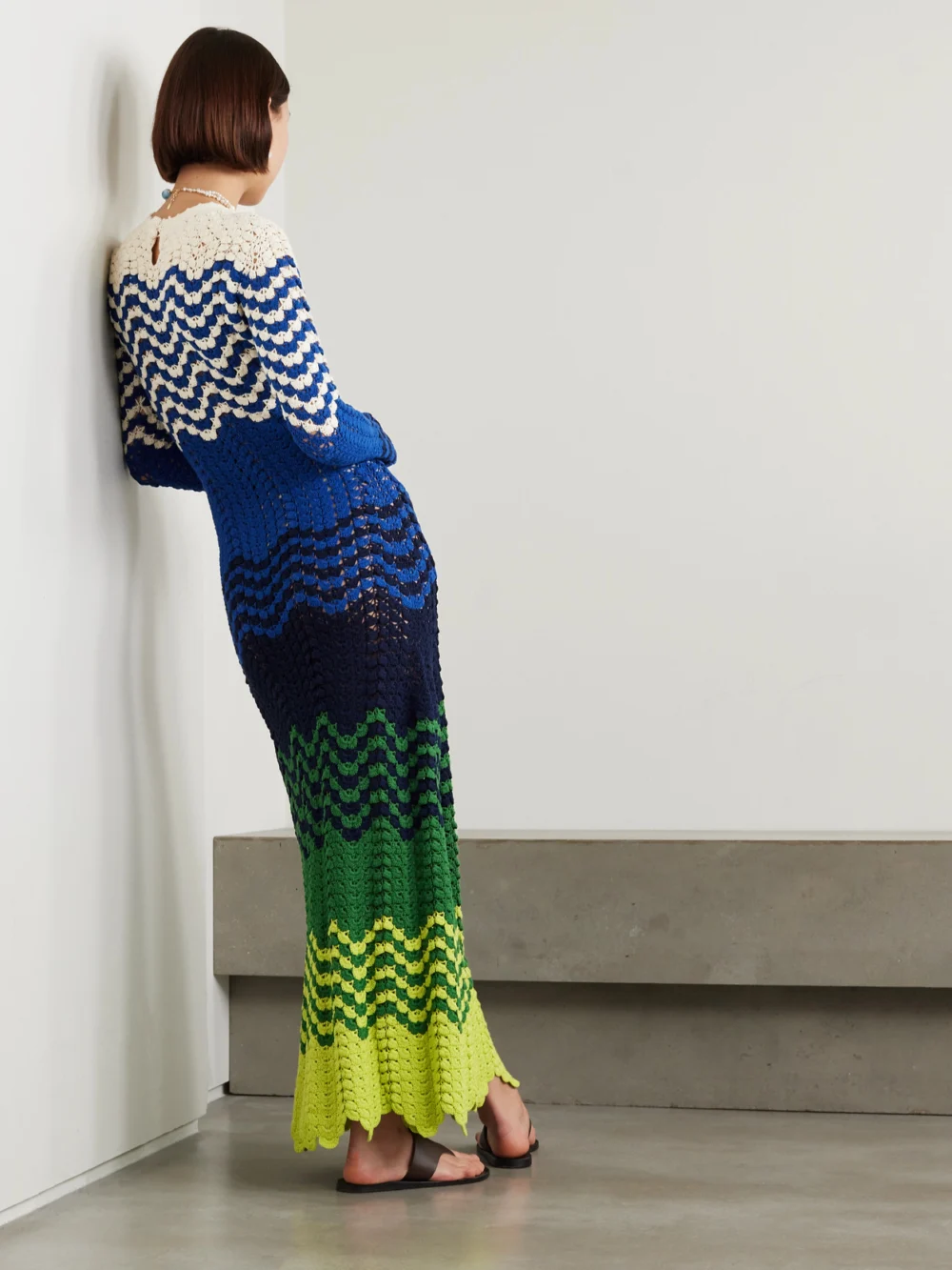 Back view of the Escvdo Musa Striped Crocheted Cotton Maxi Dress