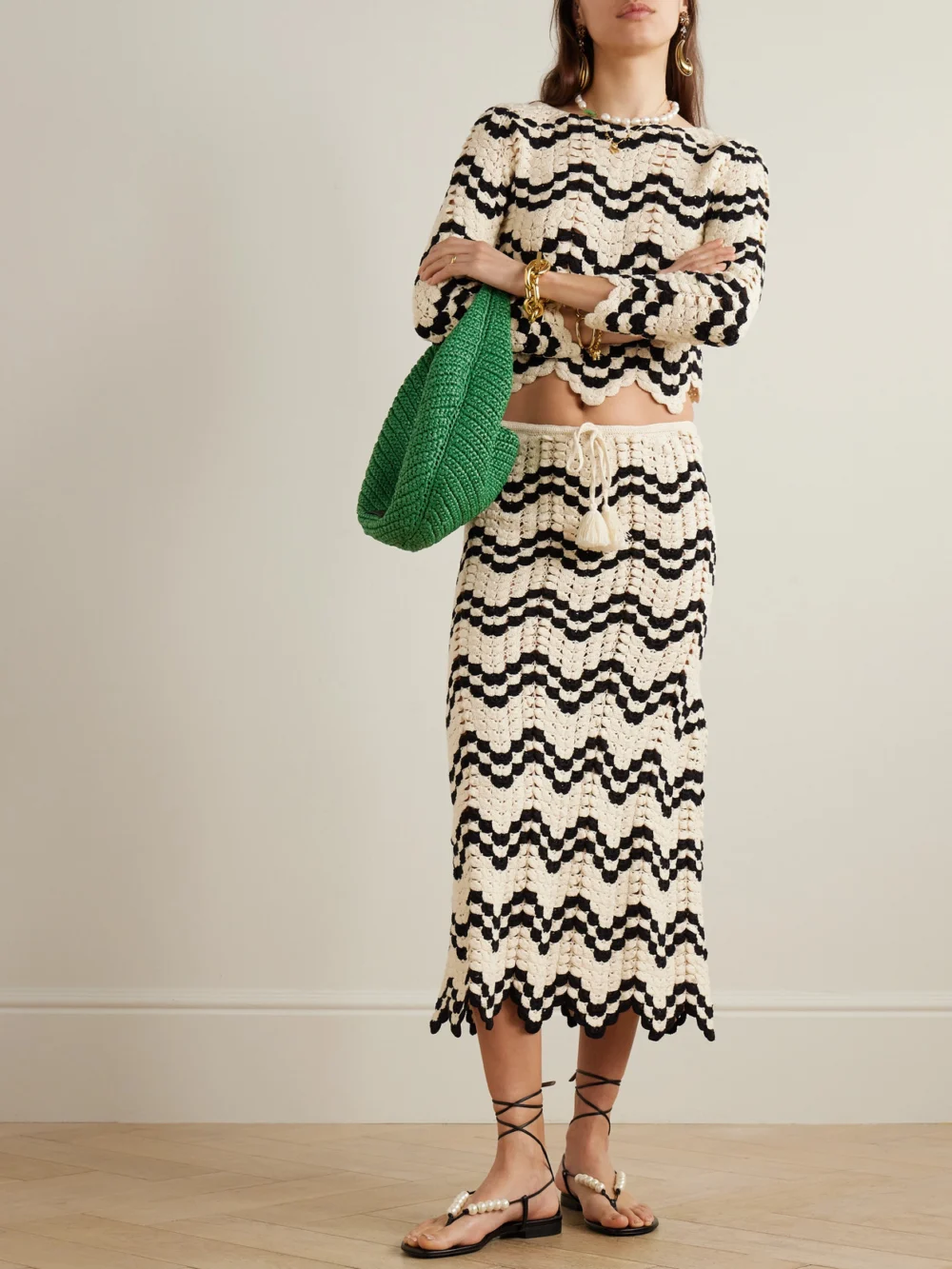 Escvdo Safi Scalloped Crocheted Cotton Midi Skirt, worn by a model