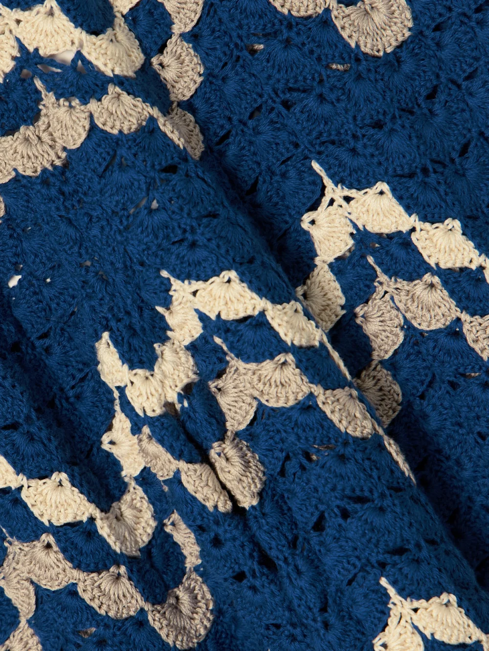 Close-up detail of the Escvdo Safi Scalloped Crocheted Organic Cotton Bootcut Pants