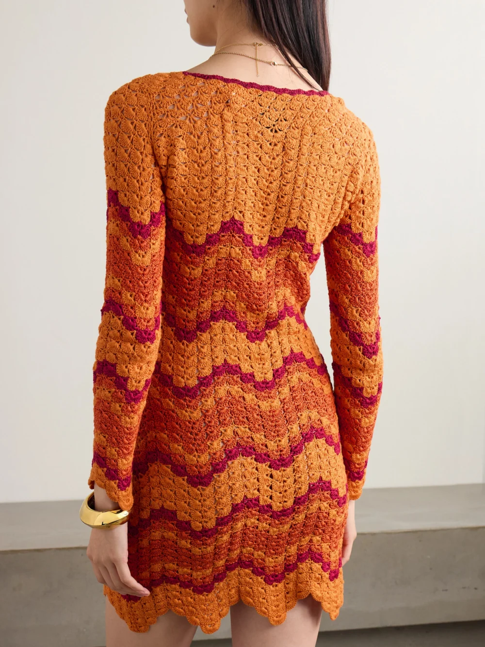 Back view of the Escvdo Sumac Scalloped Crocheted Cotton Mini Dress